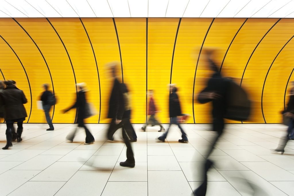 Blurred image of people commuting